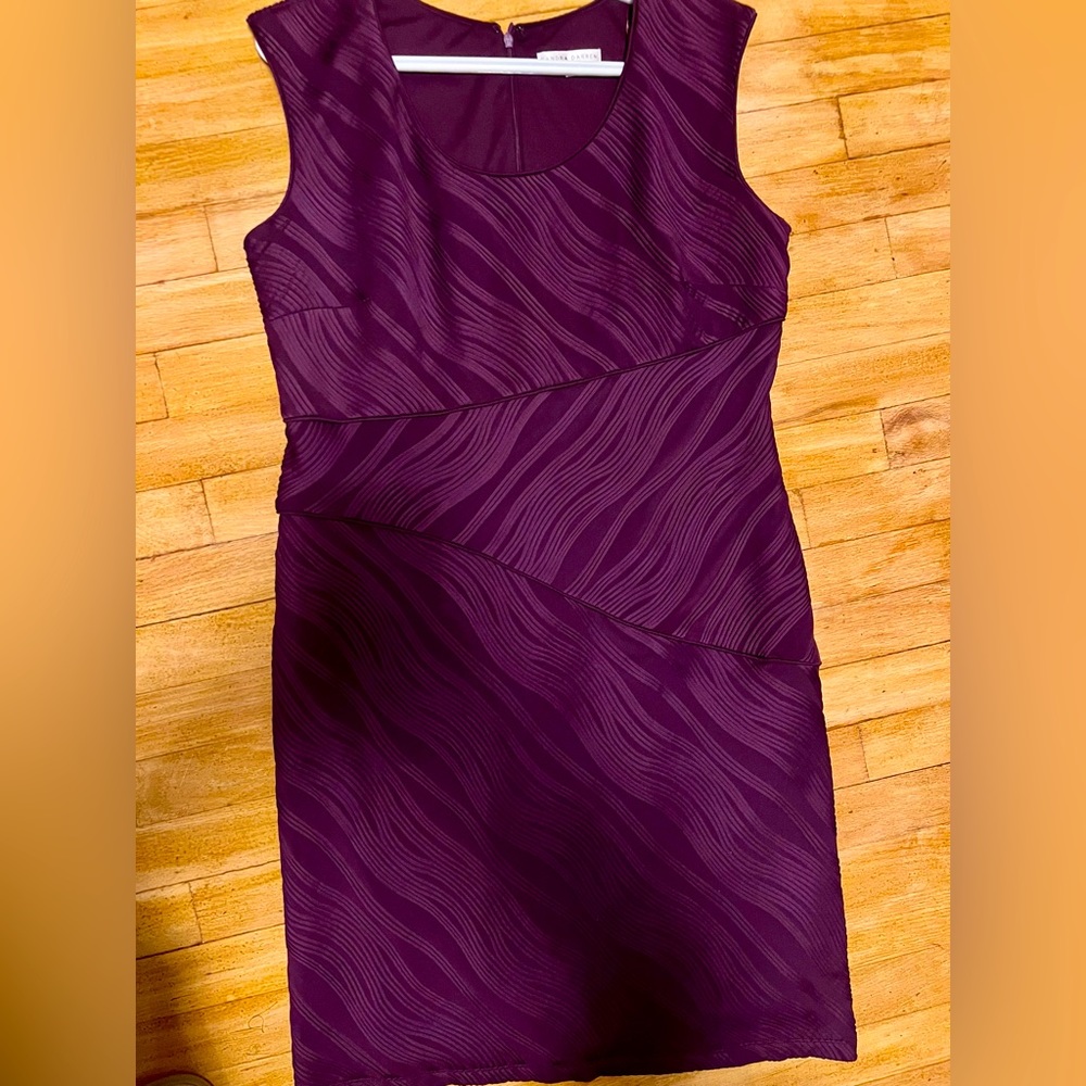 Dark purple sleeveless dress with beautiful detailing. Sandra Darren, size 14.